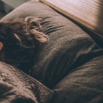 Woman sleeping, as teeth grinding often happens at night